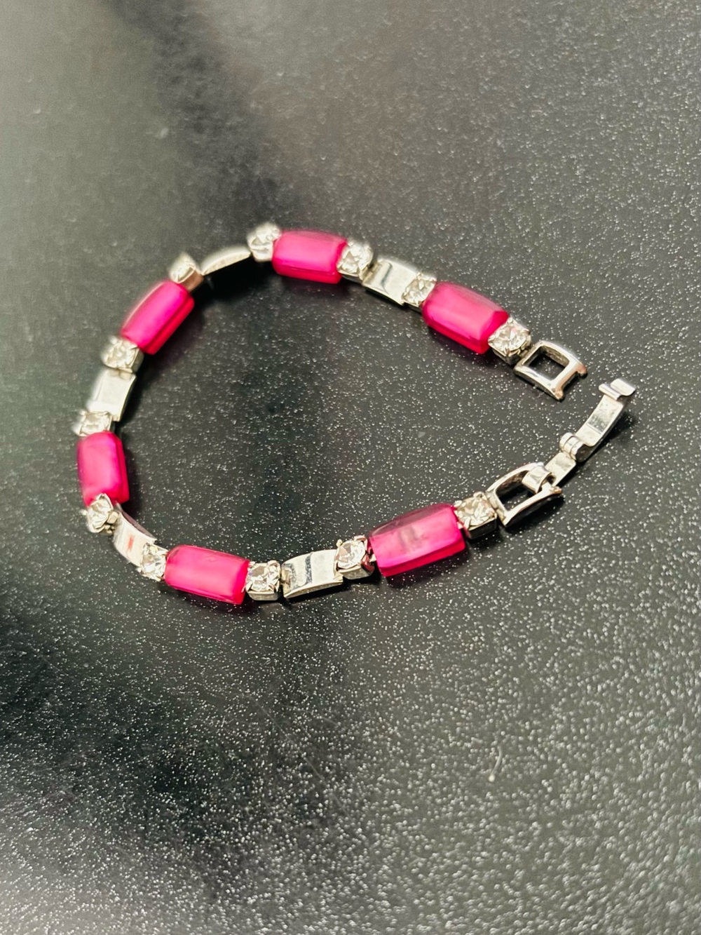 Crystal and sterling silver bracelet in magenta